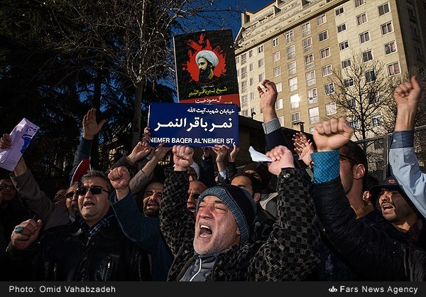 Basijis installing Sheikh Nimr street name sign in Tehran (01)