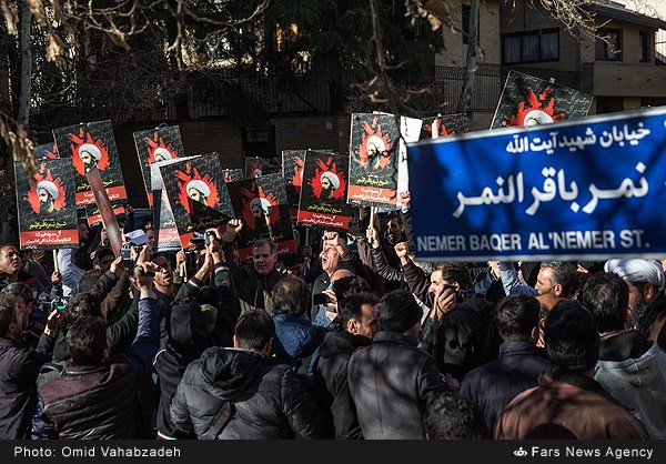 Basijis installing Sheikh Nimr street name sign in Tehran (06)