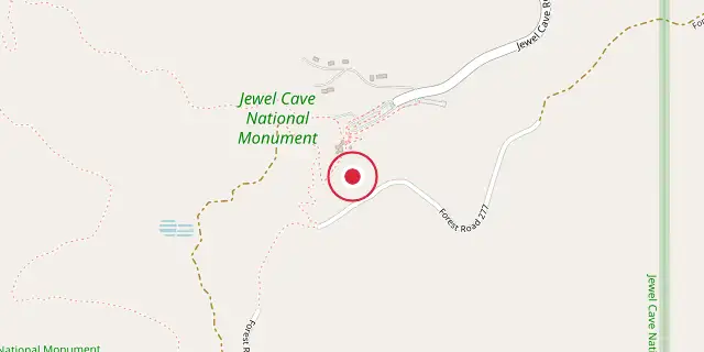 Street map of the area around Jewel Cave National Monument; the red dot marks 43°43′44″N 103°49′44″W