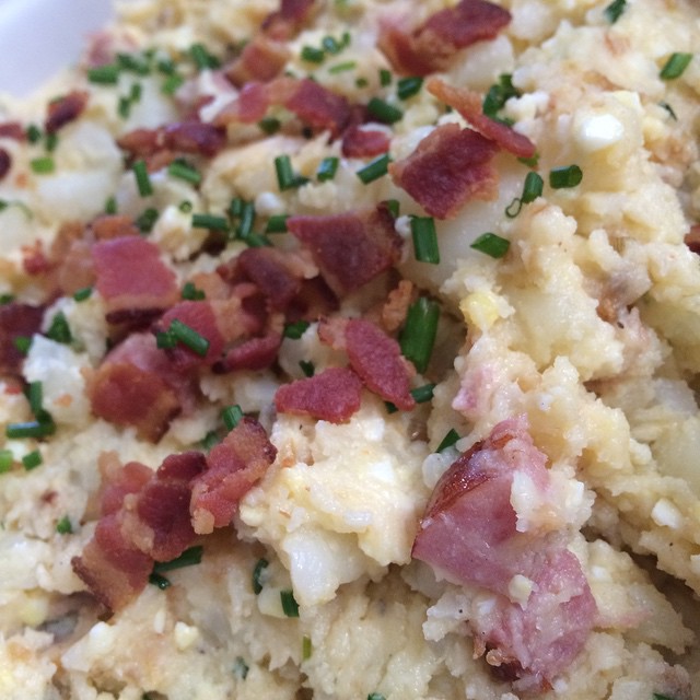 Japanese-style potato salad with Yukon gold potatoes, hard-boiled eggs, Kewpie, apple cider vinegar smoked sausage, bacon, fried shallots, and chives. -thanksgiving