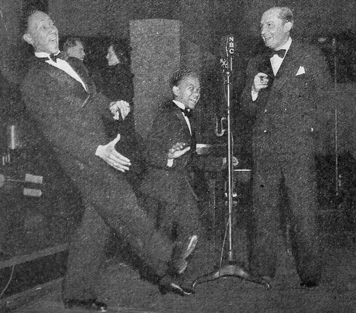 Ben Bernie with the Nicholas Brothers, snapped during a Radio City broadcast