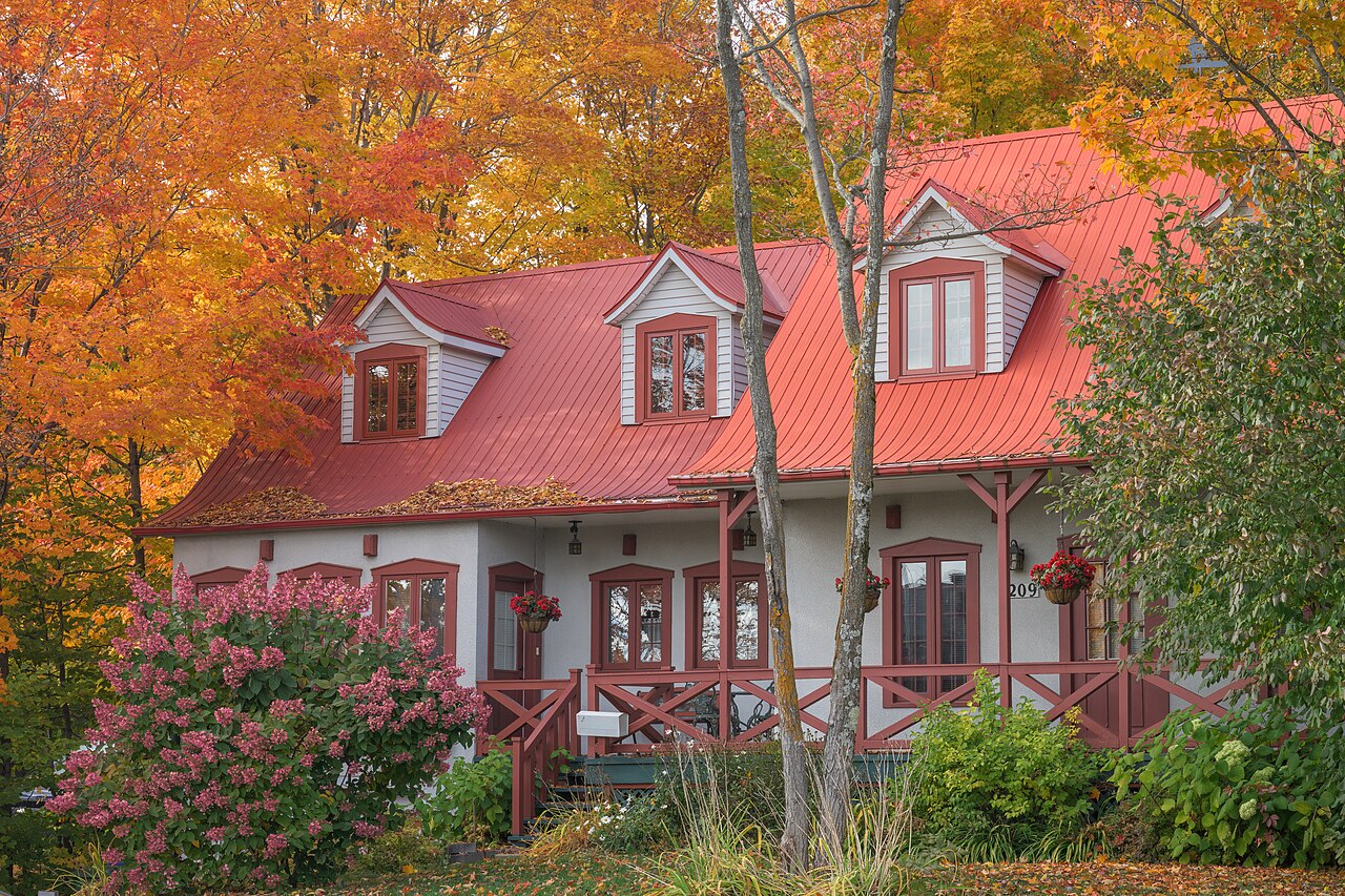 Autumnal Retreat in Old Quebec- A Canvas of Fading Reds and Vibrant Oranges
