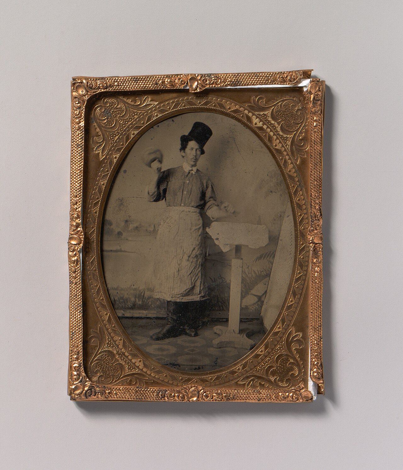 Stone Mason in Top Hat and Apron with Mallet and Chisel- MET DP700438