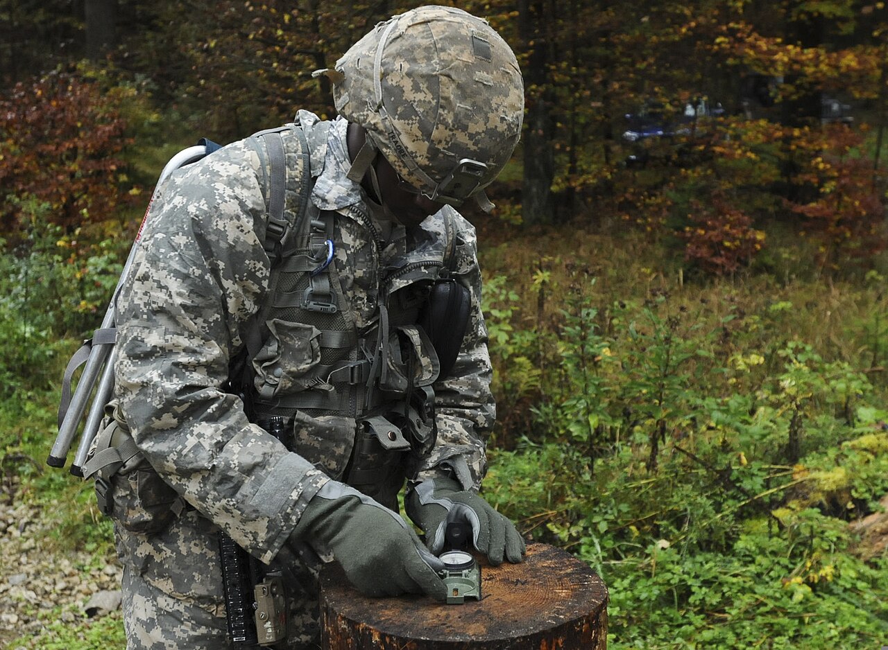 A U.S. Soldier assigned to the 2nd Cavalry Regiment competes with Soldiers from other units during the land navigation day course as part of the Expert Infantryman Badge Competition at Grafenwoehr Training Area 141020-A-EM105-758