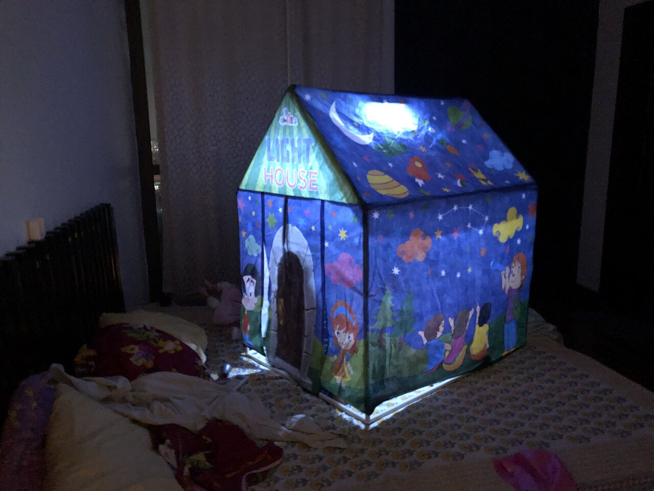 A tent on a bed