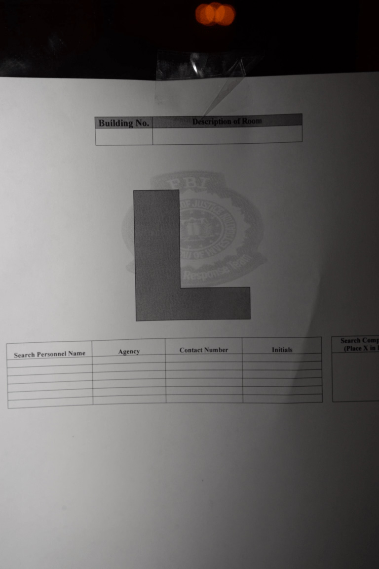 EFTA00001020 - FBI search warrant form with a large L symbol indicating the location of a room to be searched