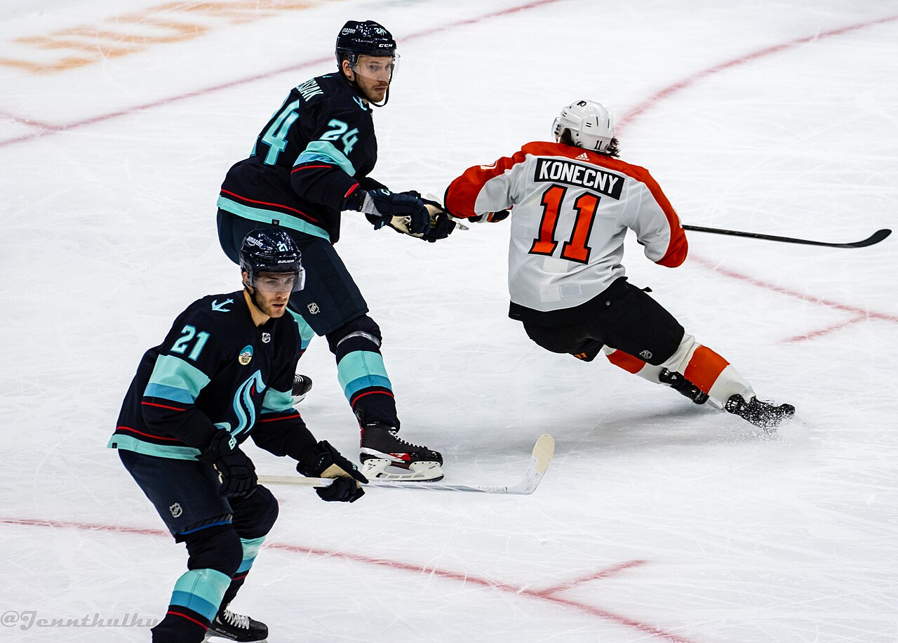 Philadelphia Flyers at Seattle Kraken - December 29, 2023 - Jamie Oleksiak, Travis Konecny, and Alexander Wennberg
