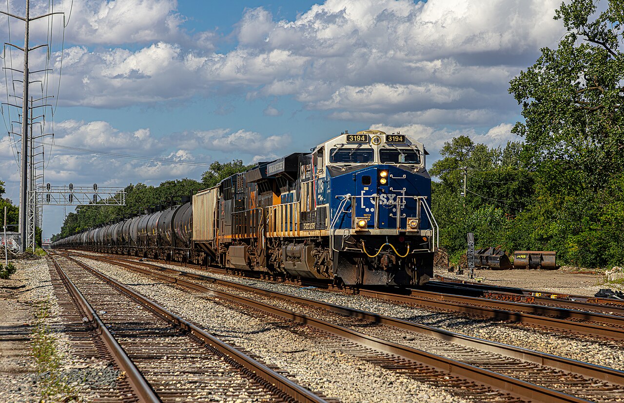 CSX 3194 "Spirit of Law Enforcement" locomotive leading a train