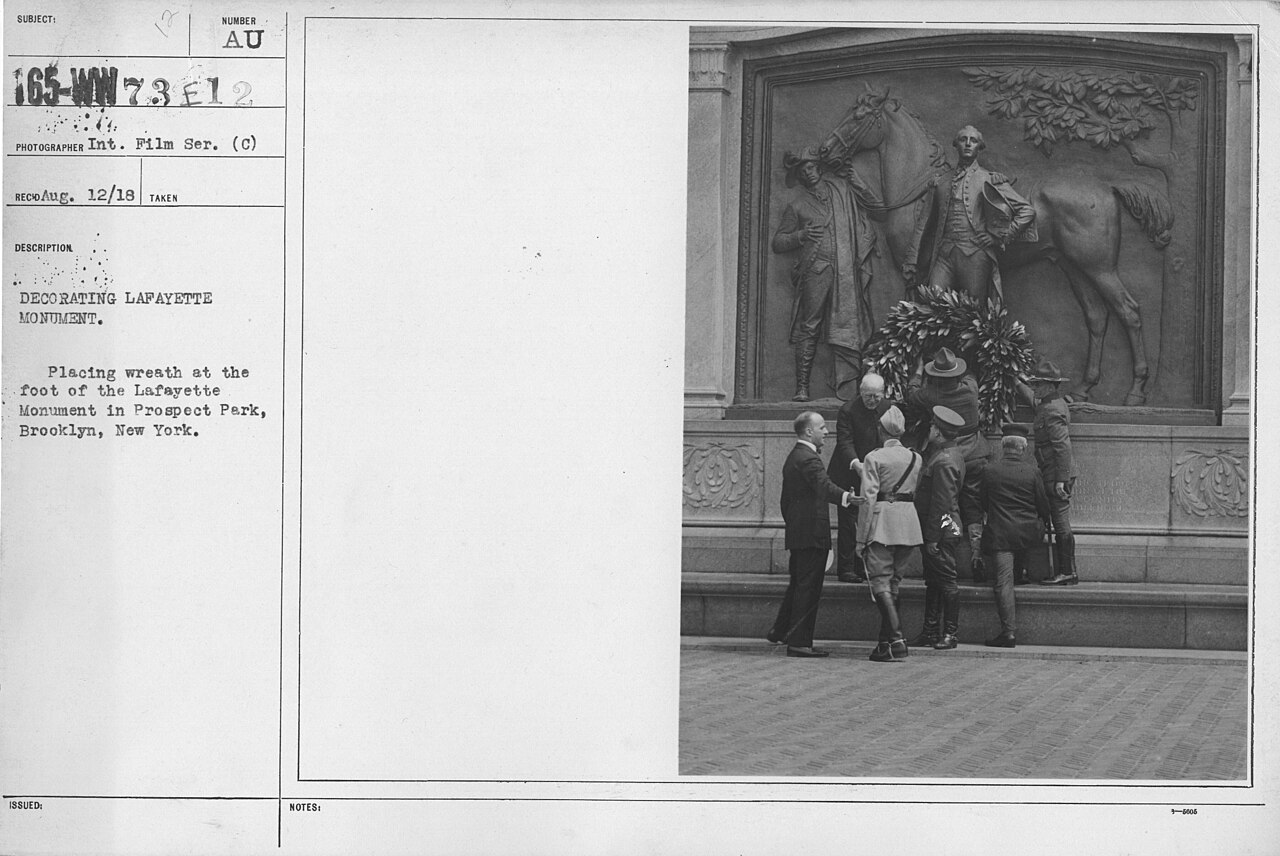 Ceremonies - Lafayette Day, 1918 - Decorating Lafayette Monument. Placing wreath at the foot of the Lafayette Monument in Prospect Park, Brooklyn, New York - NARA