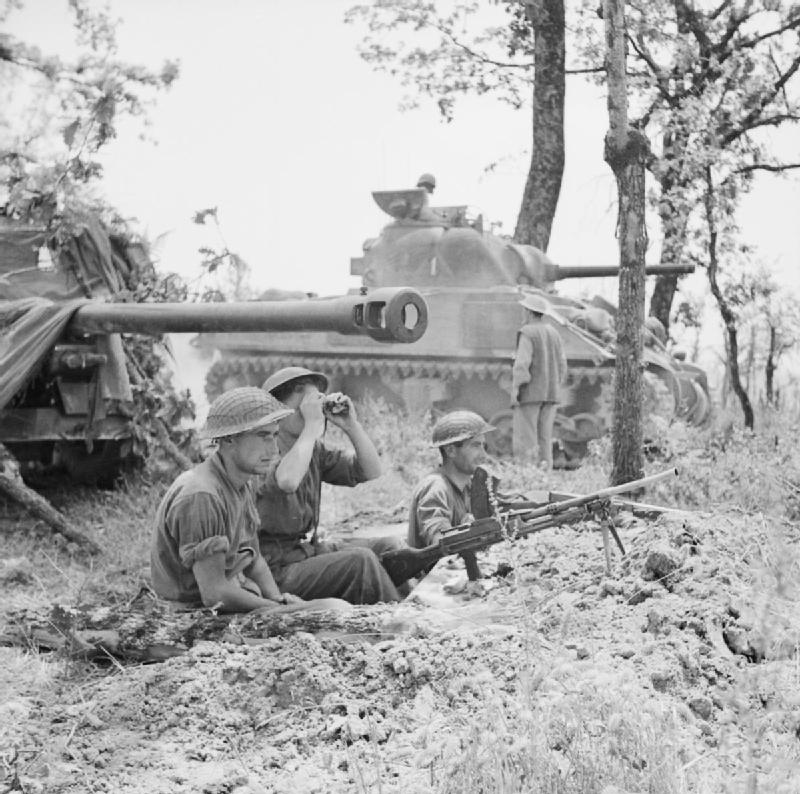 A British 17-pdr anti-tank gun and Sherman tank near Cassino, Italy, 17 May 1944. NA15075
