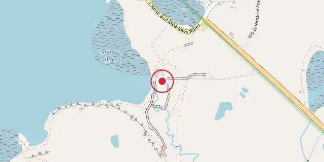 Street map of the area around L'Anse aux Meadows; the red dot marks 51°35′46″N 55°31′59″W