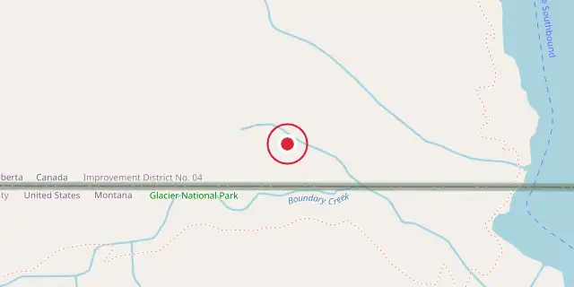 Street map of the area around Waterton-Glacier International Peace Park; the red dot marks 49°00′00″N 113°55′01″W